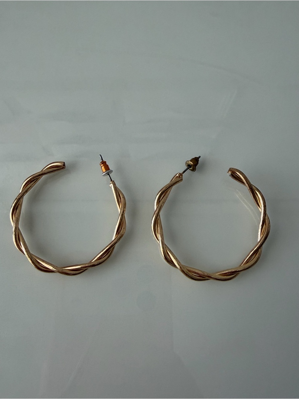 Twisted Hoop Earrings in Rose Gold